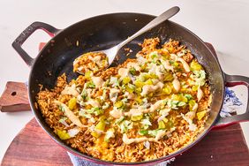 skillet cheeseburger rice on board with blue napkin