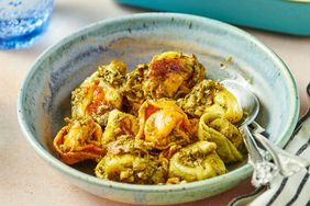 A bowl of pesto tortellini