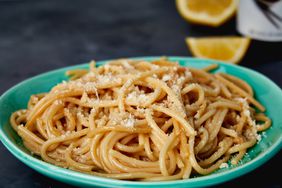 buttered noodles with lemon, parmesan, and soy in aqua pasta bowl