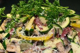 sauteed zucchini, mushrooms, and bell pepper side dish with Parmesan cheese