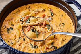 Marry Me Chicken Soup being served out of a Dutch oven. 